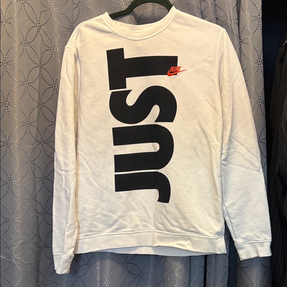Vintage Nike White Sweatshirt with Black Text and Red Swoosh